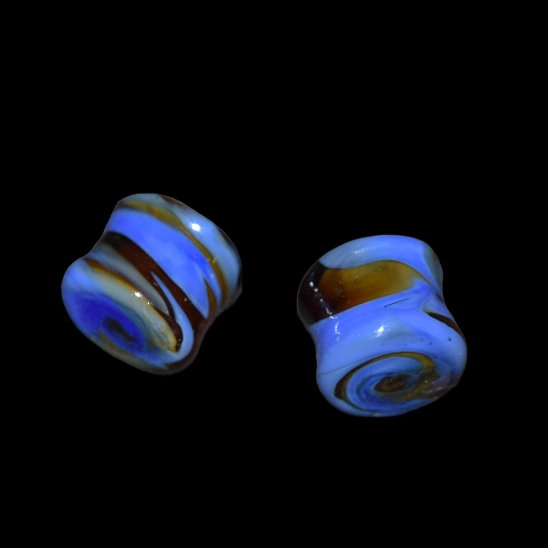 Écarteur en verre bleu rouge vague